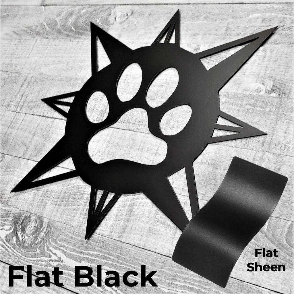 black compass rose with dog paw in center on a wooden background with color panel