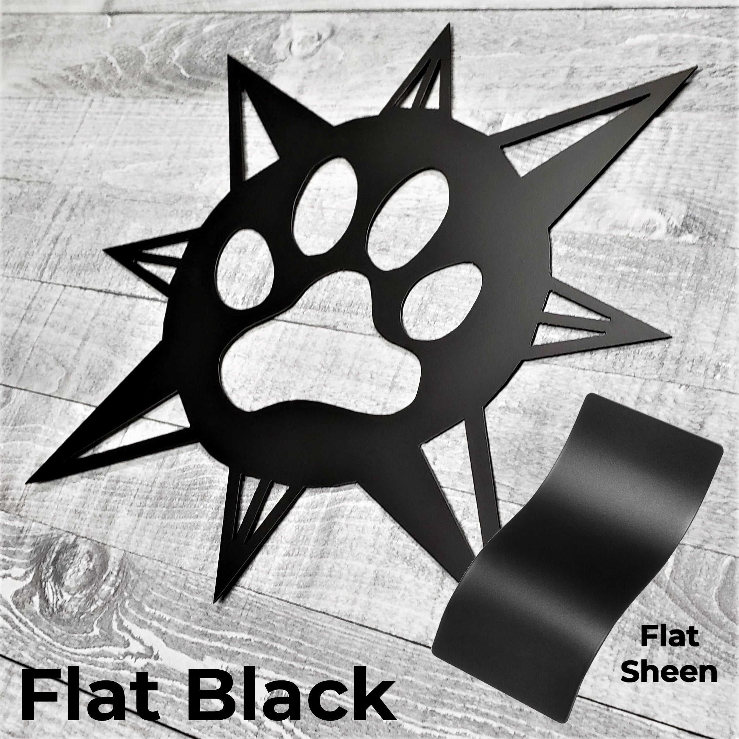 black compass rose with dog paw in center on a wooden background with color panel