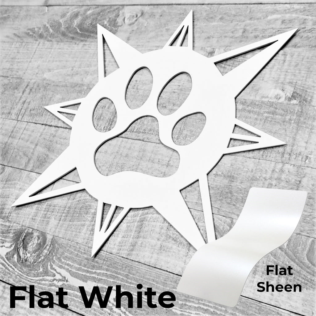 white compass rose with dog paw in center on a wooden background with color panel