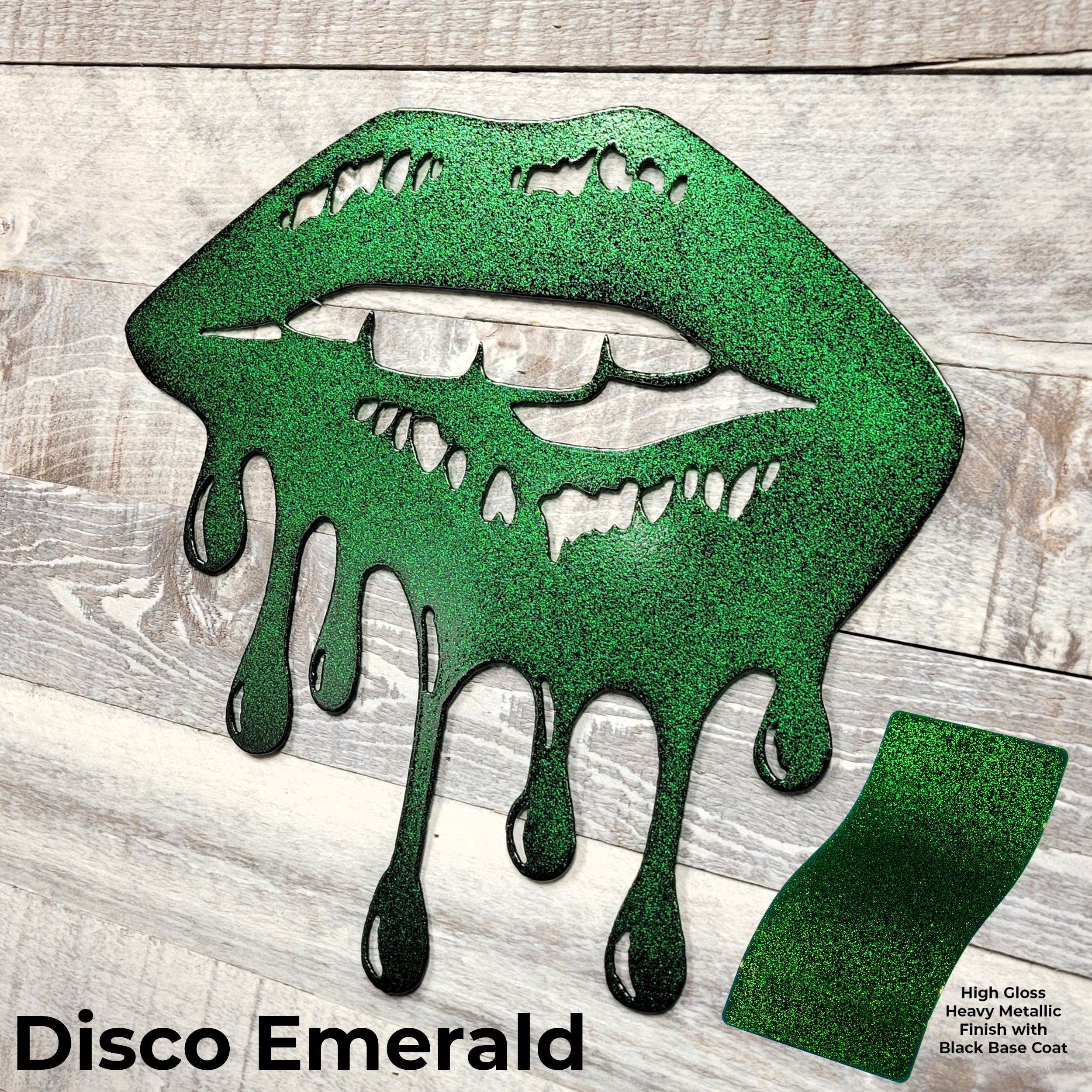 Green glittery lips with 'Disco Emerald' text on a wooden background