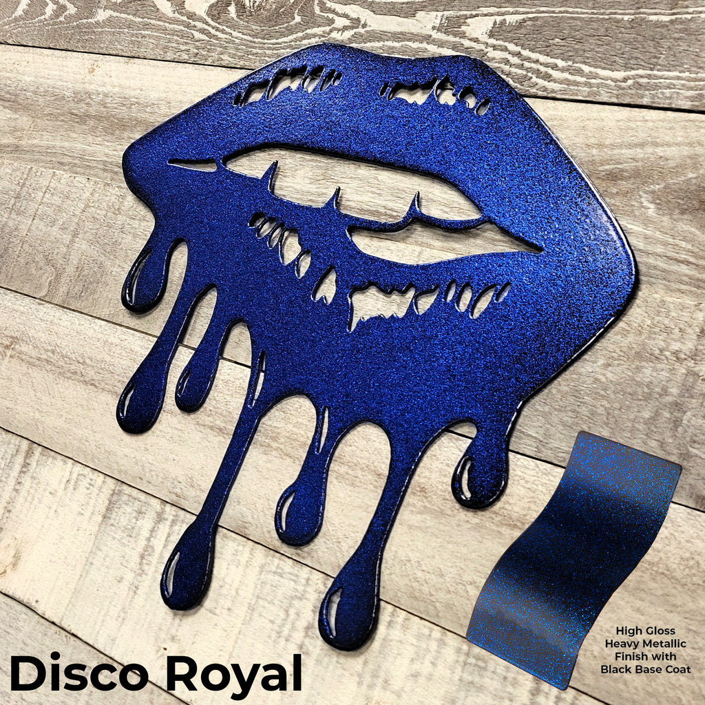 Metallic blue lips sculpture on a wooden surface with 'Disco Royal' text.