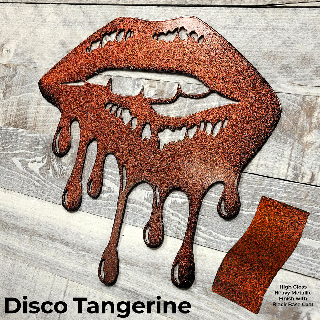 Metallic lips sculpture with a glossy finish on a wooden surface, labeled 'Disco Tangerine'.