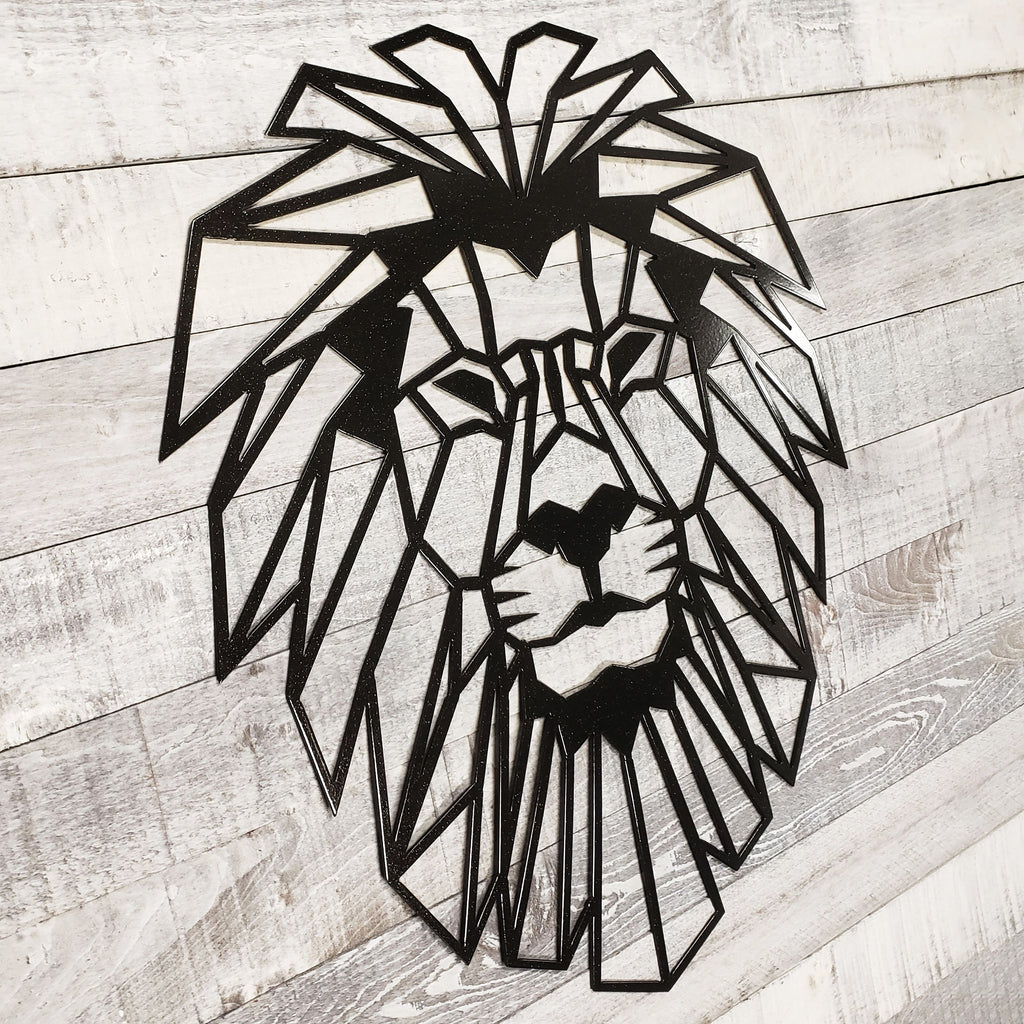 Geometric black lion head wall art on a wooden background