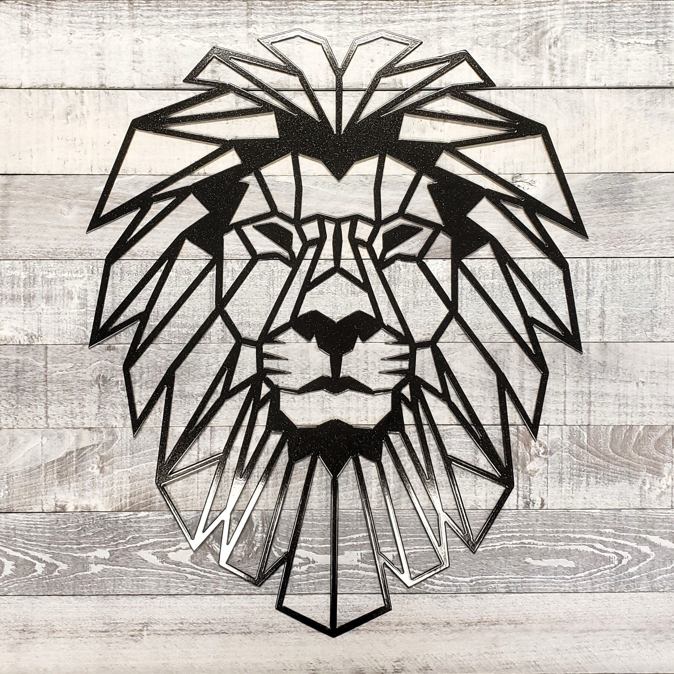 Geometric lion head design on a wooden background