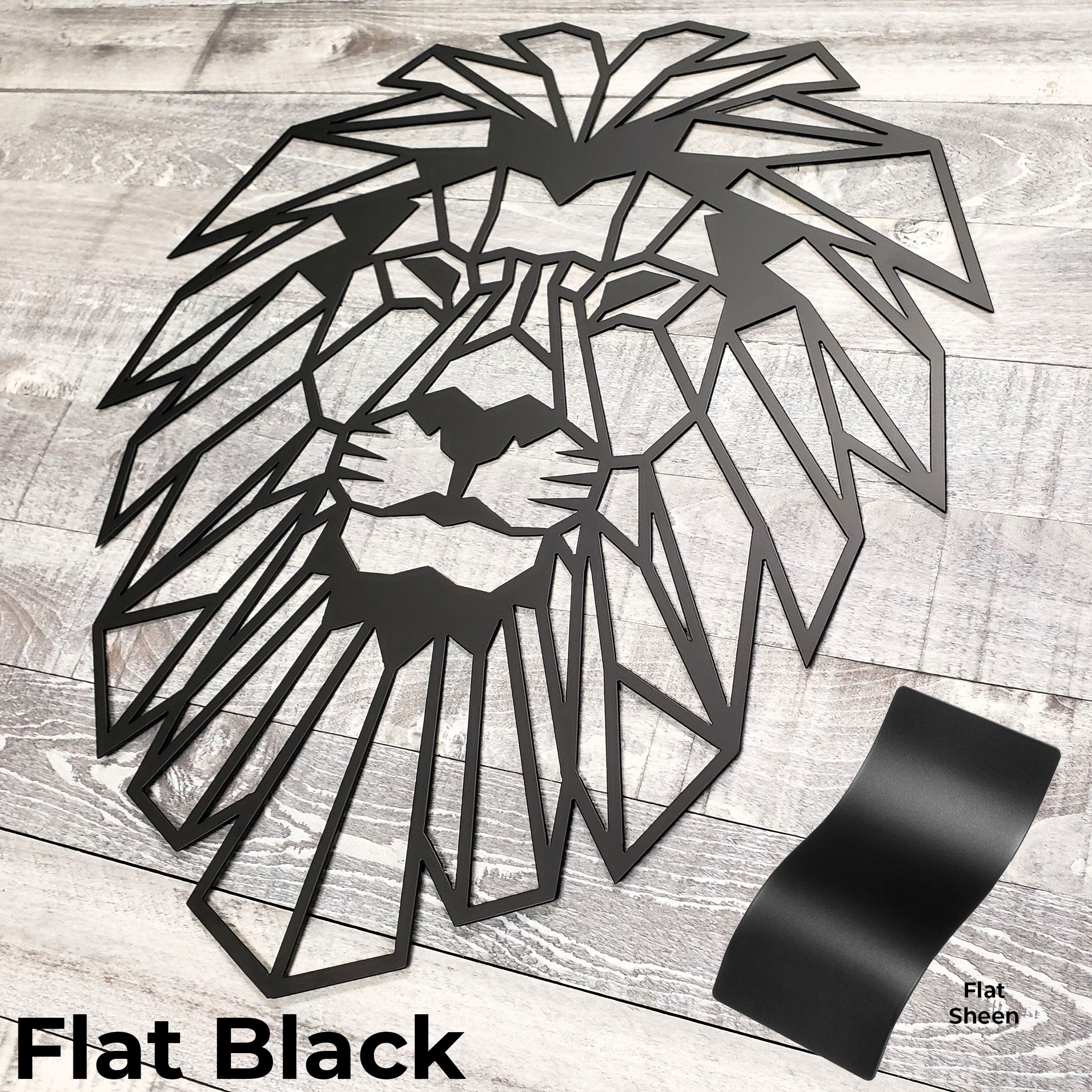 Geometric lion head design in flat black on a wooden surface