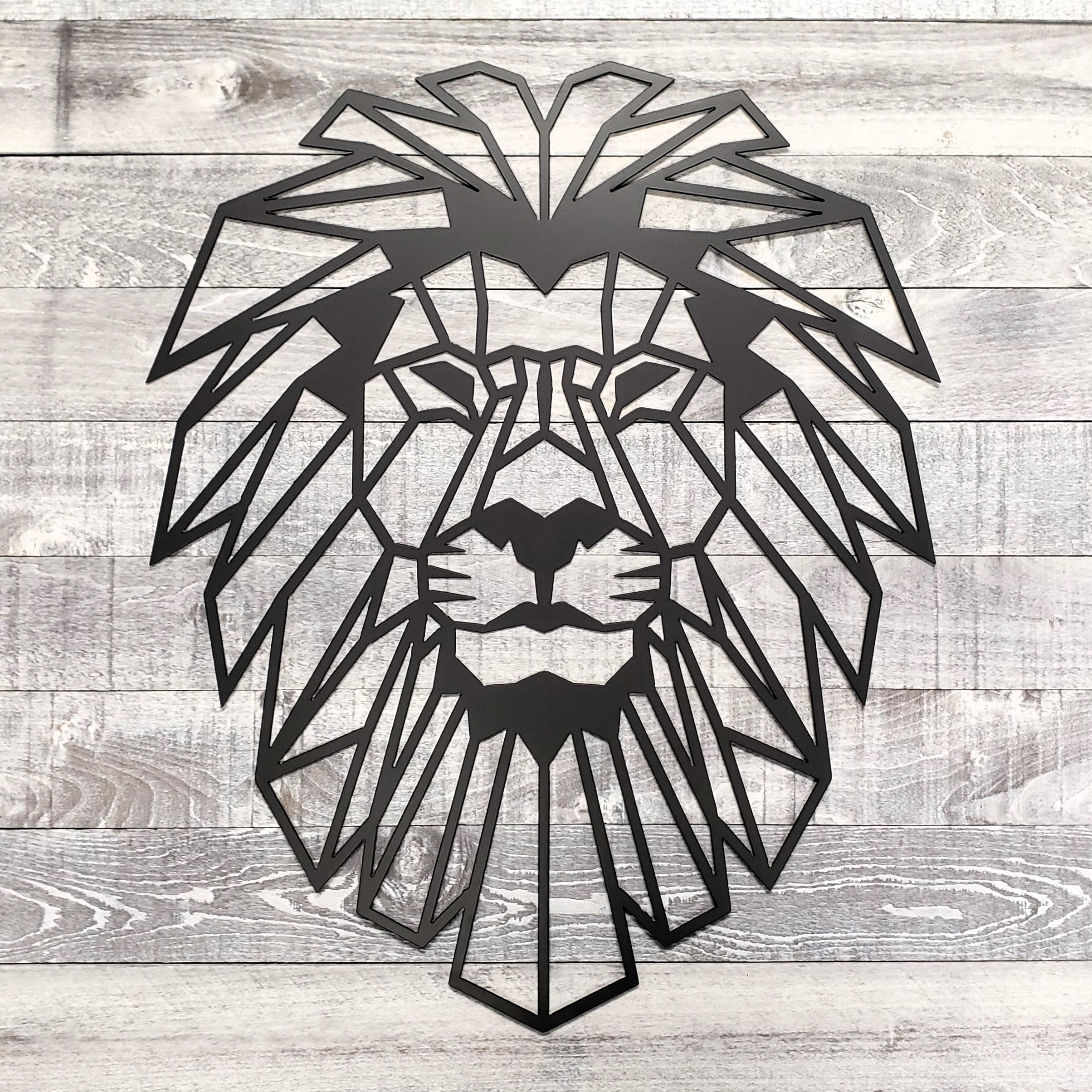 Geometric lion head design on a wooden background