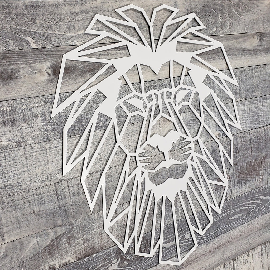 Geometric lion head design on a wooden surface