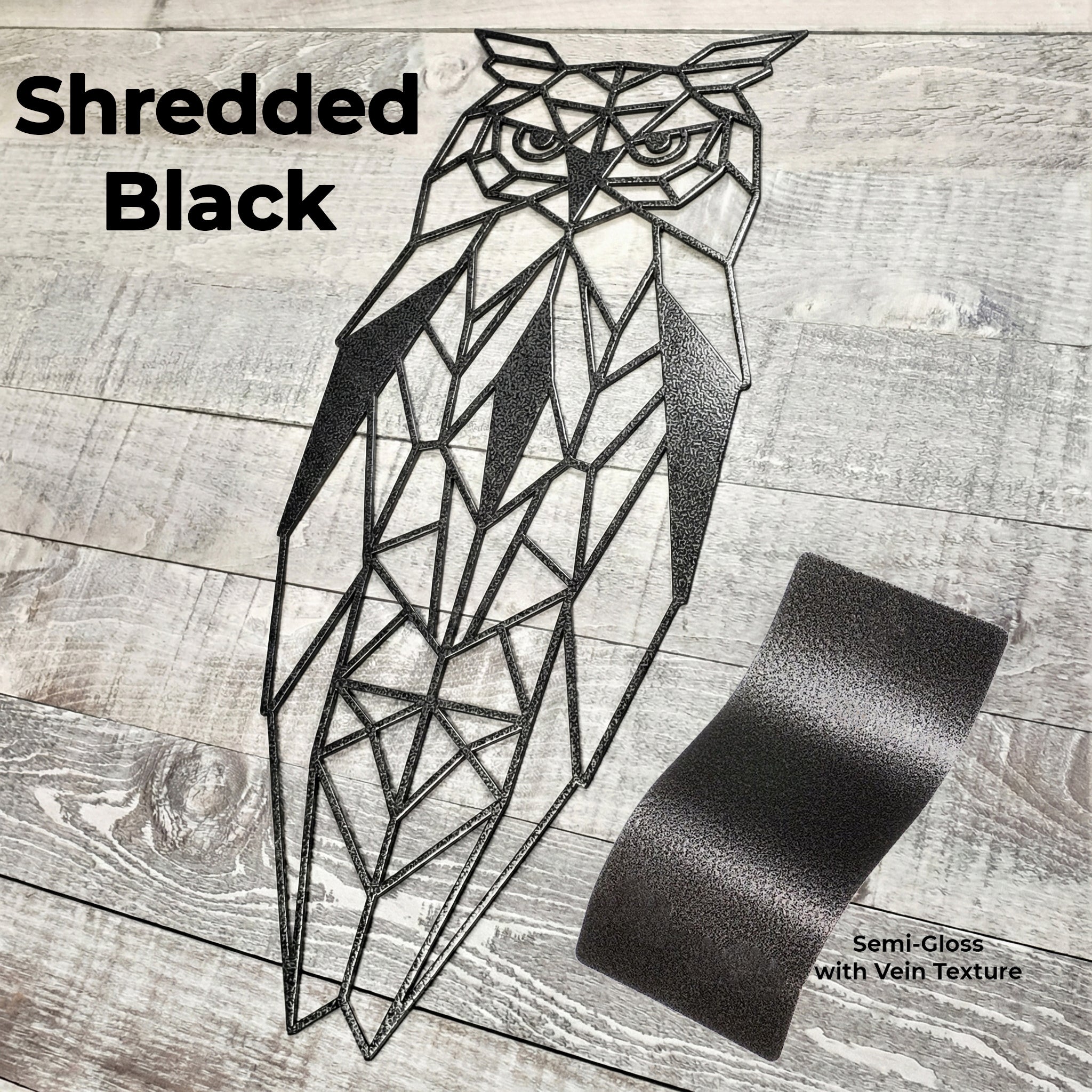 black geometric owl metal wall art on a wooden background with color panel 