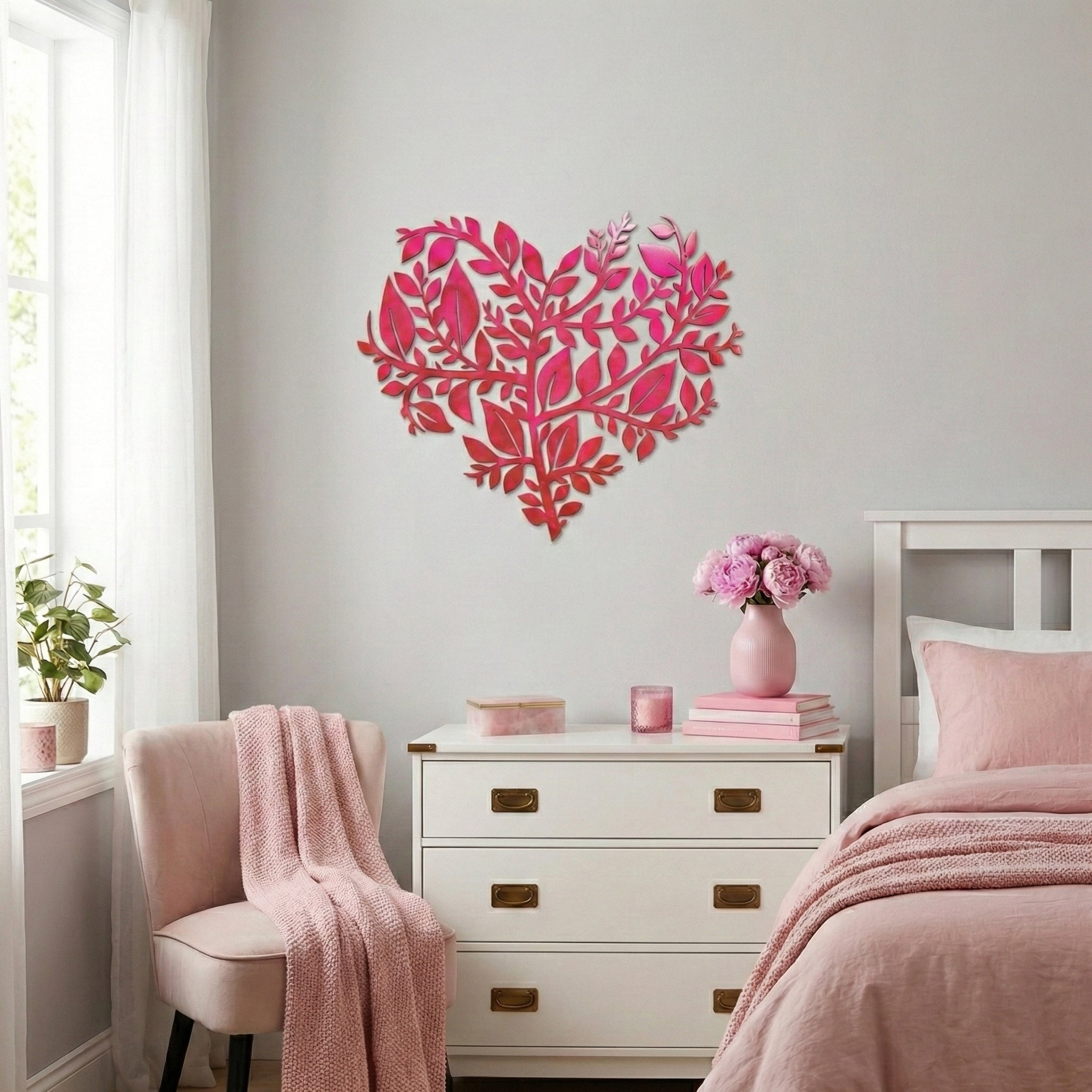 Decorative pink heart wall art in a bedroom with a bed, dresser, and chair.