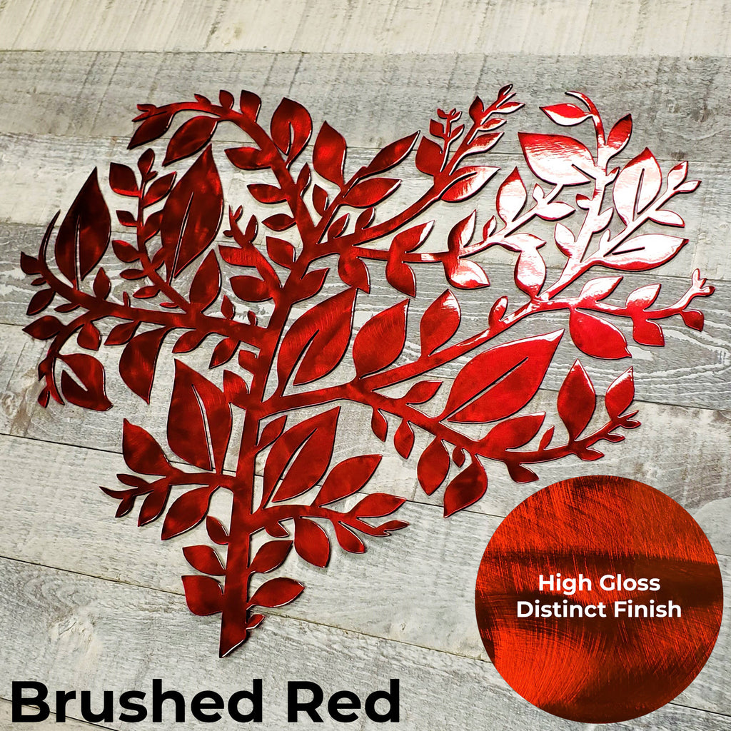 Metallic red leaf design on a wooden surface with 'Brushed Red' text and color swatch.