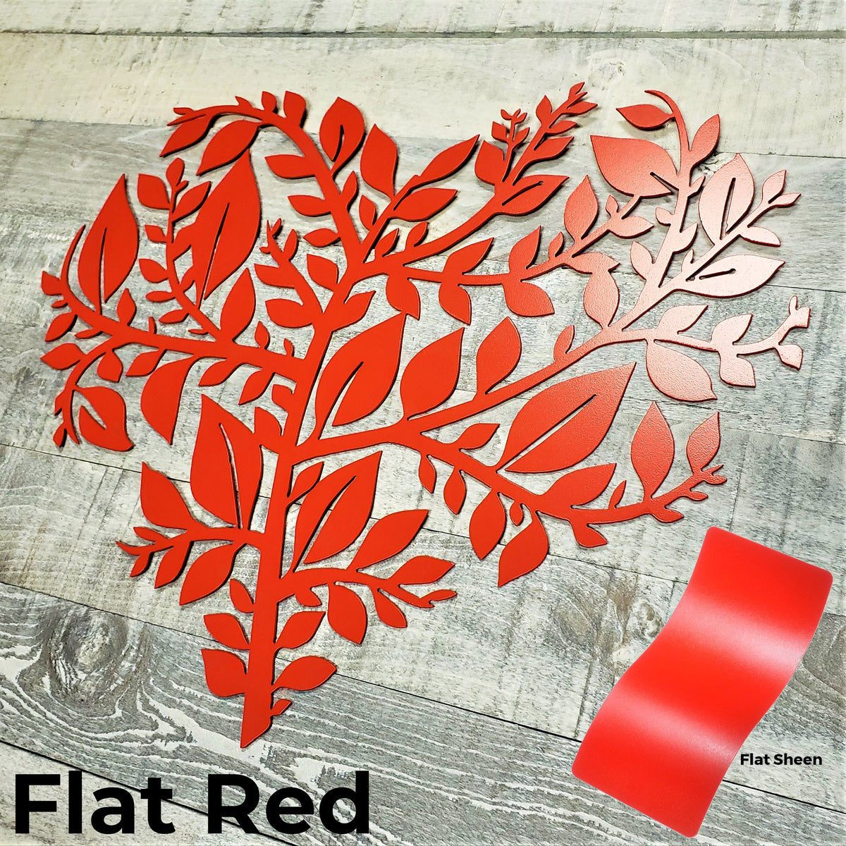 Red leaf-shaped cutout on a wooden surface with 'Flat Red' label.