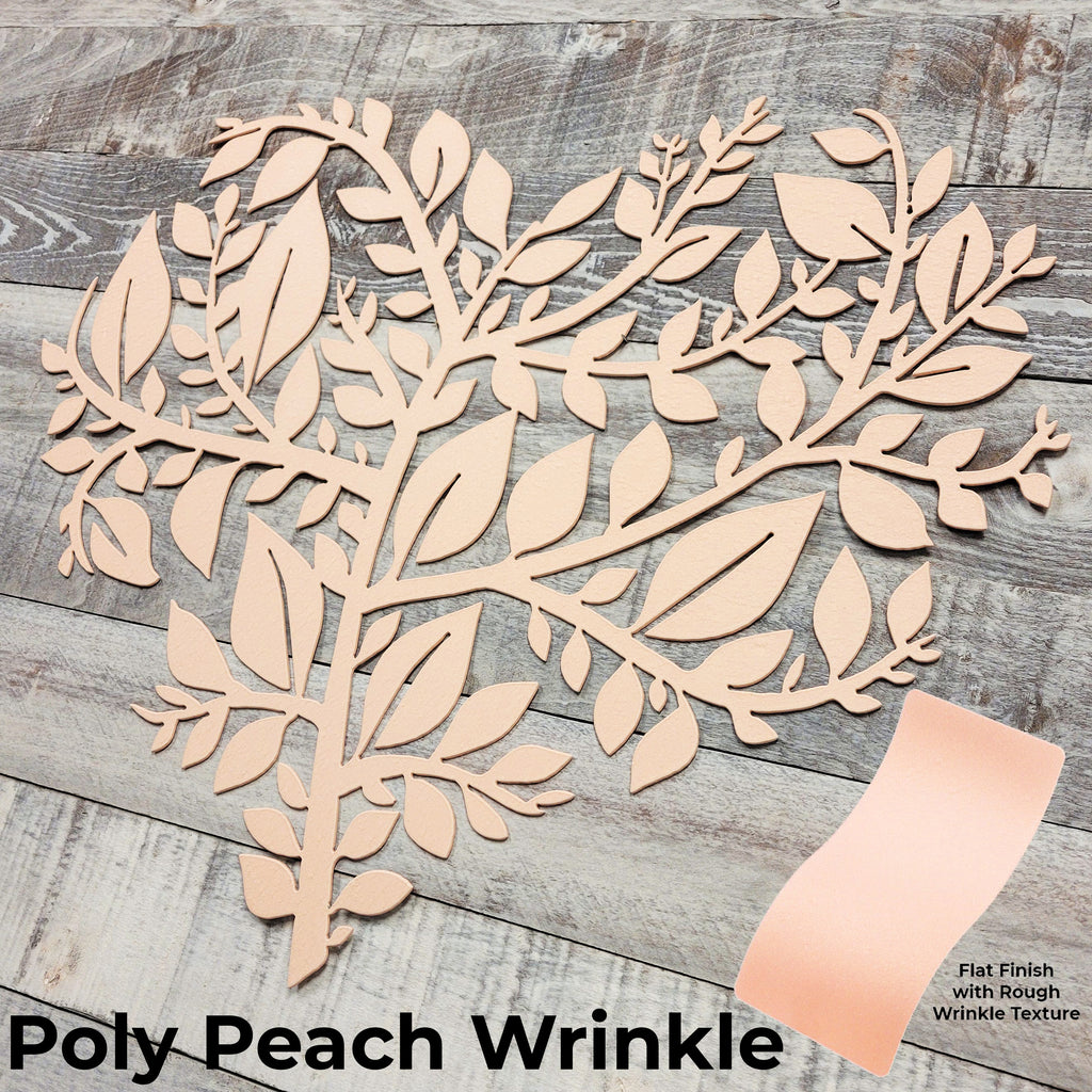 Decorative wall piece with leaf design in Poly Peach Wrinkle finish on a wooden surface.