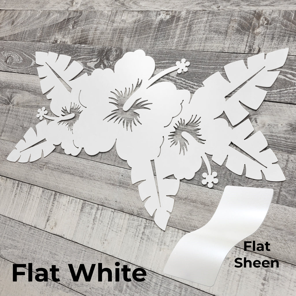 Decorative flower wall art in flat white and flat sheen on a wooden surface
