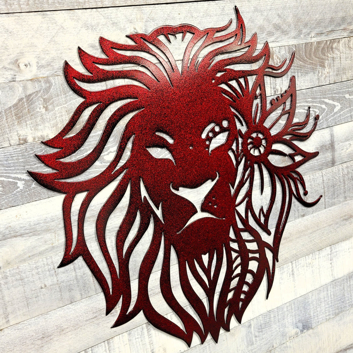 decorative red lion wall art with mandala flourishes on a wooden background