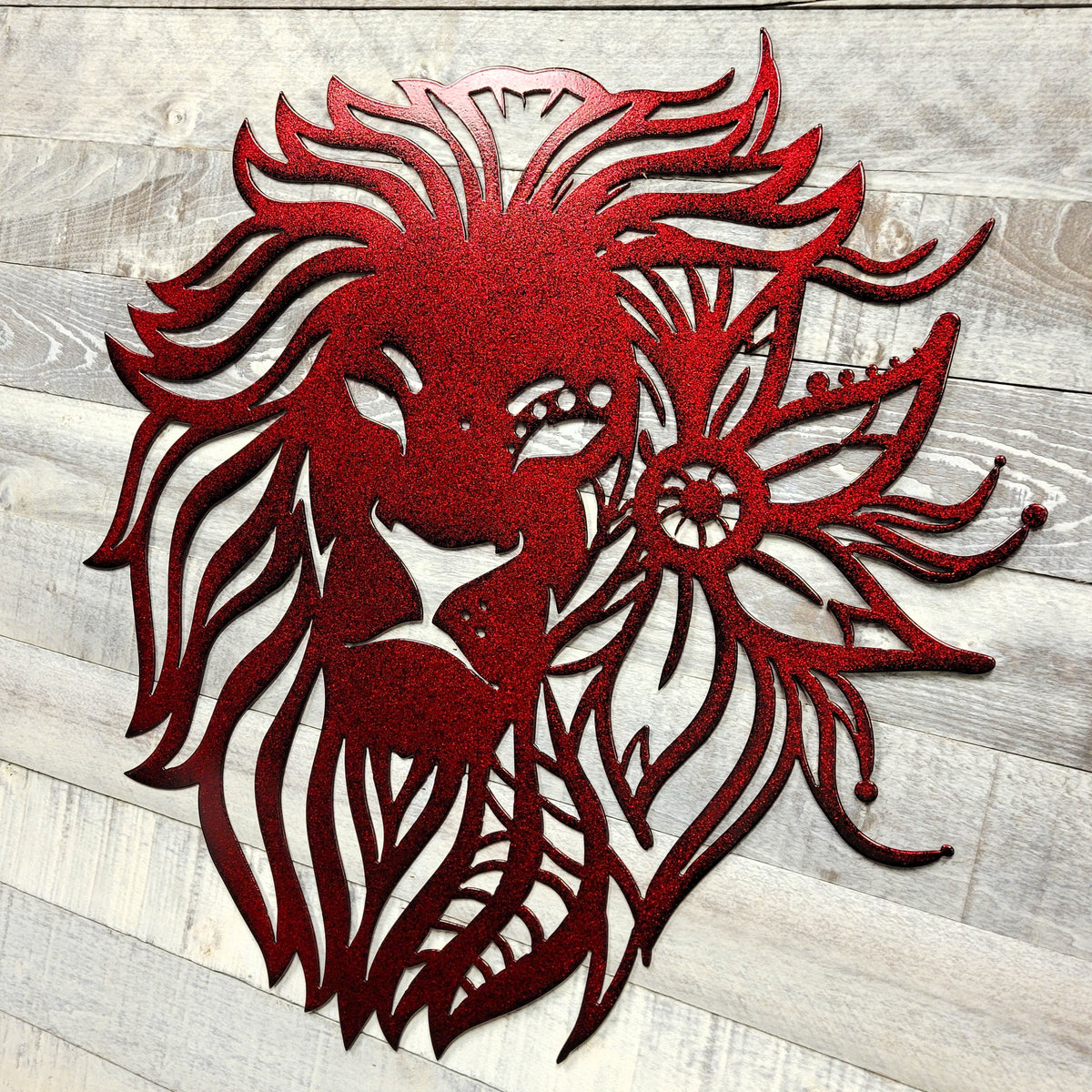 decorative red lion wall art with mandala flourishes on a wooden background