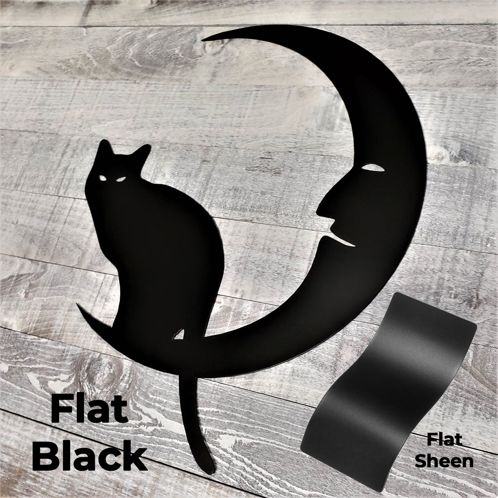 Black cat on a crescent moon silhouette on a wooden background