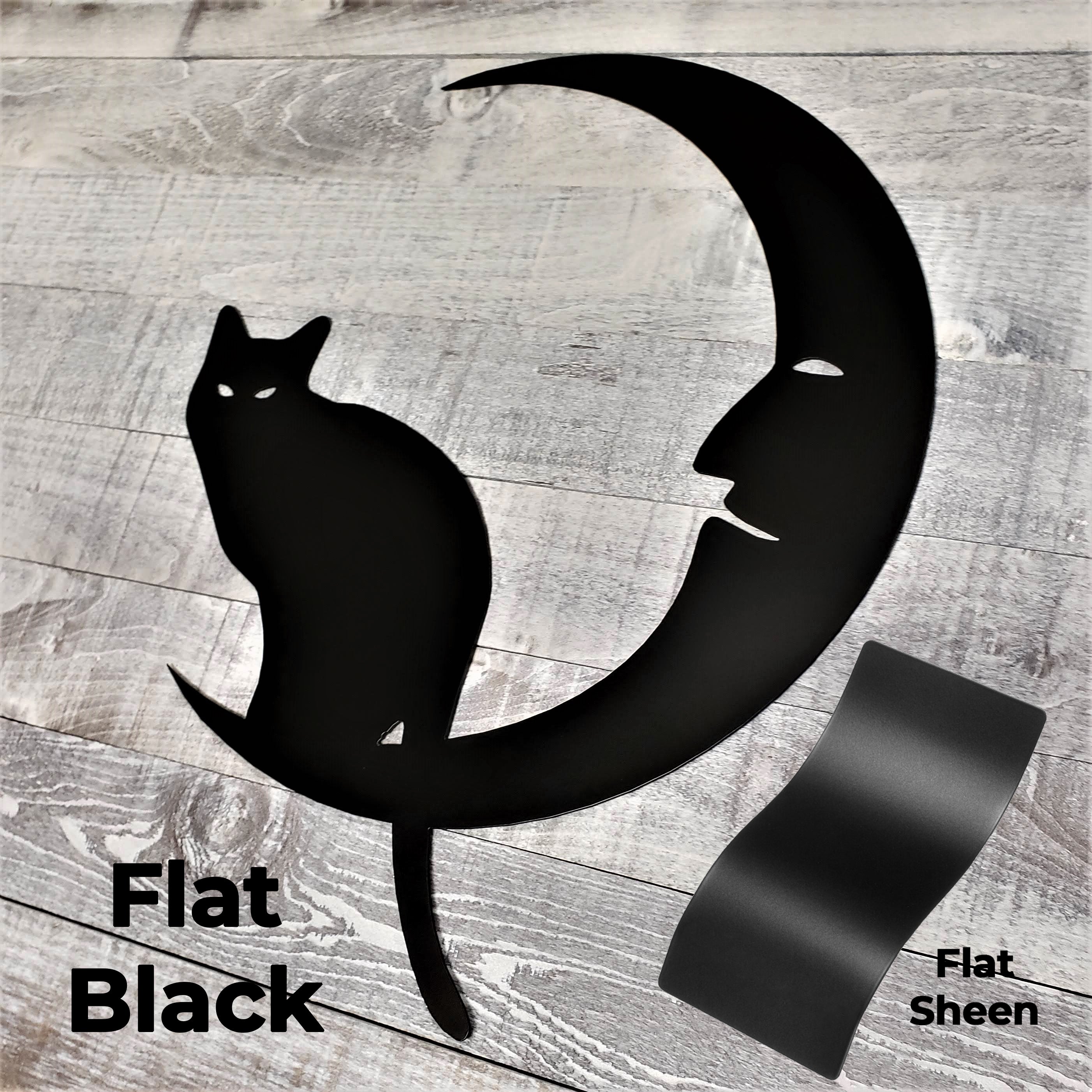 Black cat on a crescent moon silhouette on a wooden background