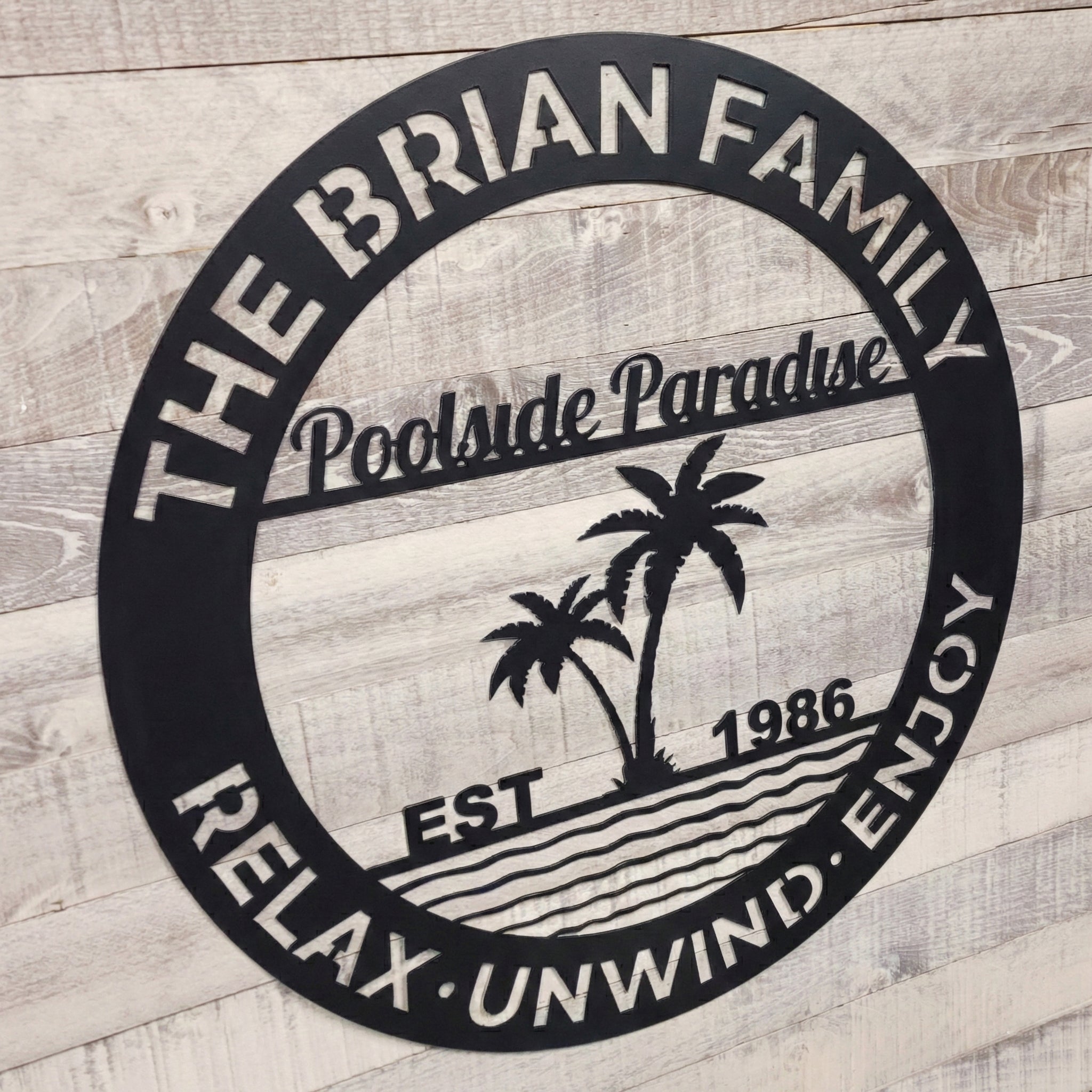 Decorative sign for pool patio on a wooden background