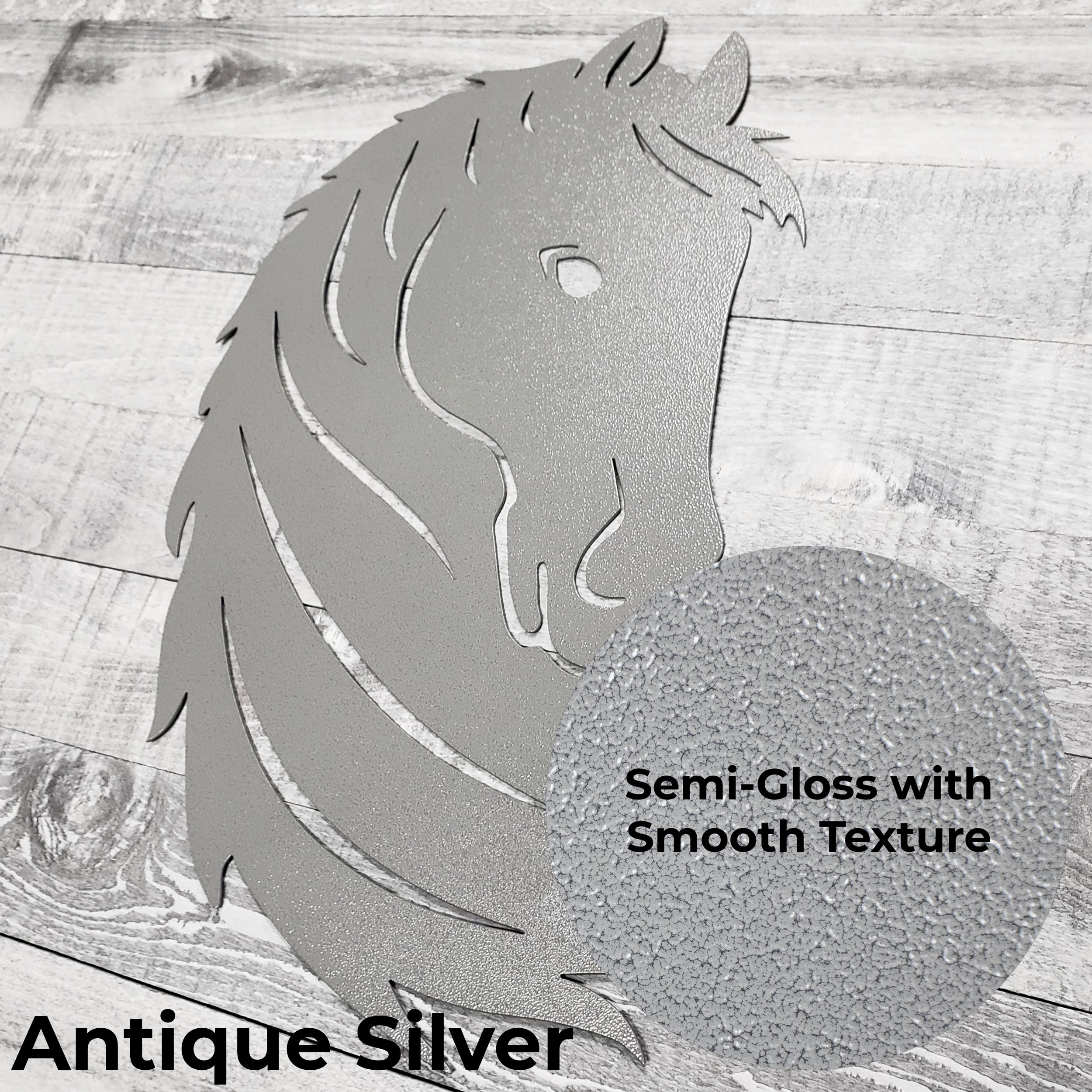 Silver metal horse head wall art on a wooden surface with a close-up of the color finish