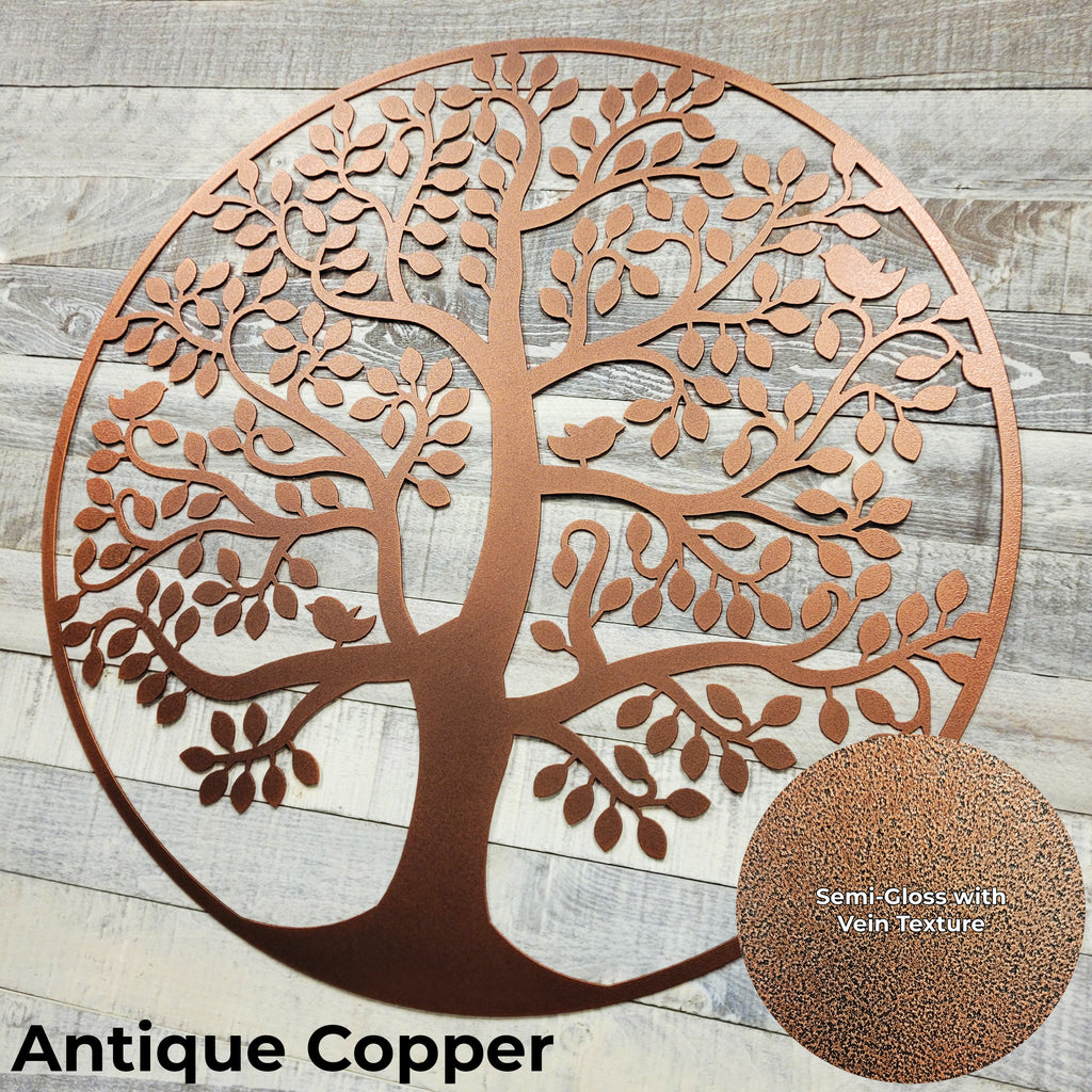 Decorative metal tree wall art in antique copper color on a wooden background