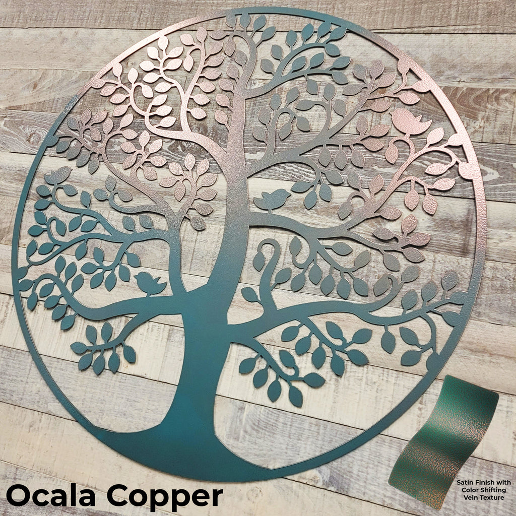 Decorative metal tree wall art with 'Ocala Copper' finish on a wooden background