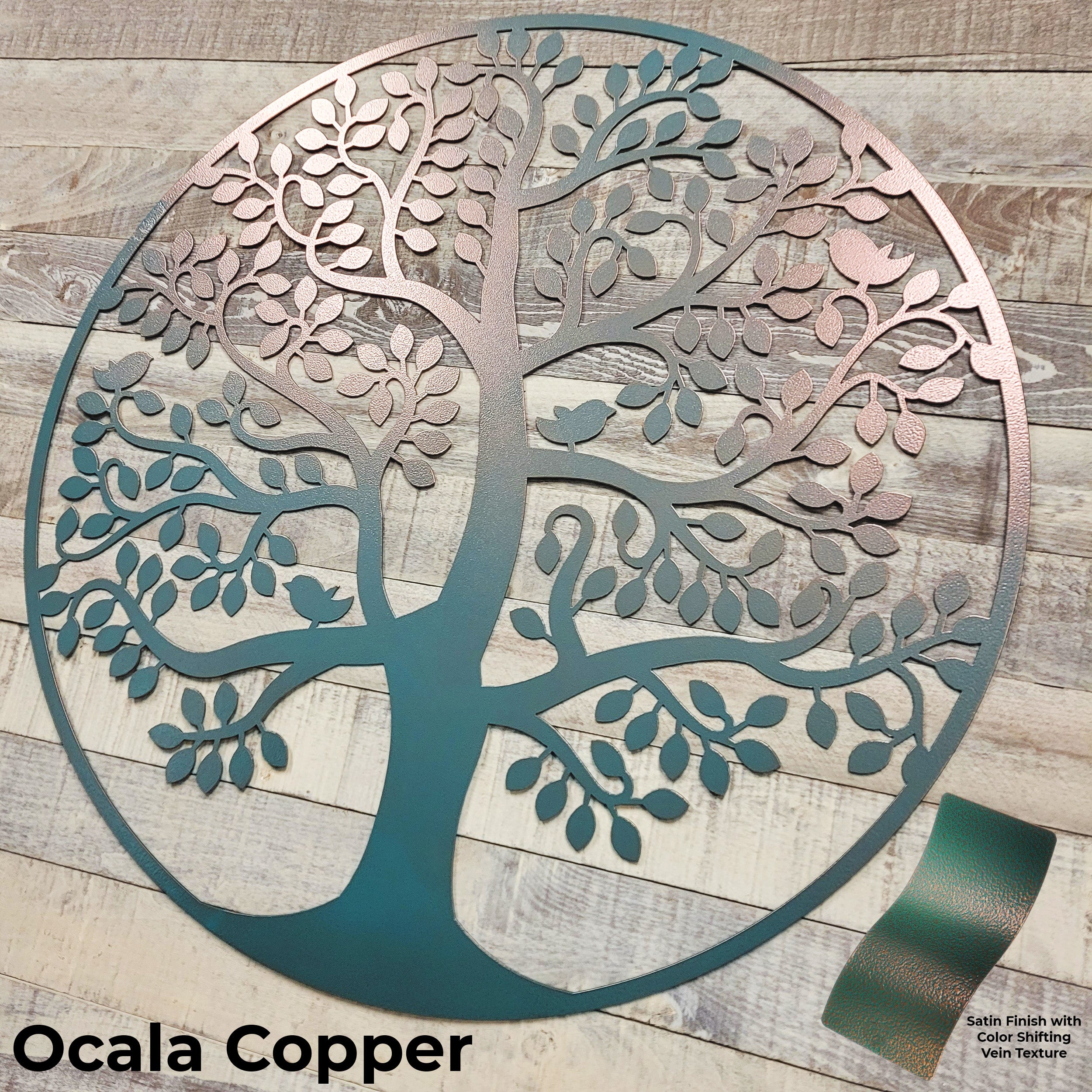 Decorative metal tree wall art with 'Ocala Copper' finish on a wooden background