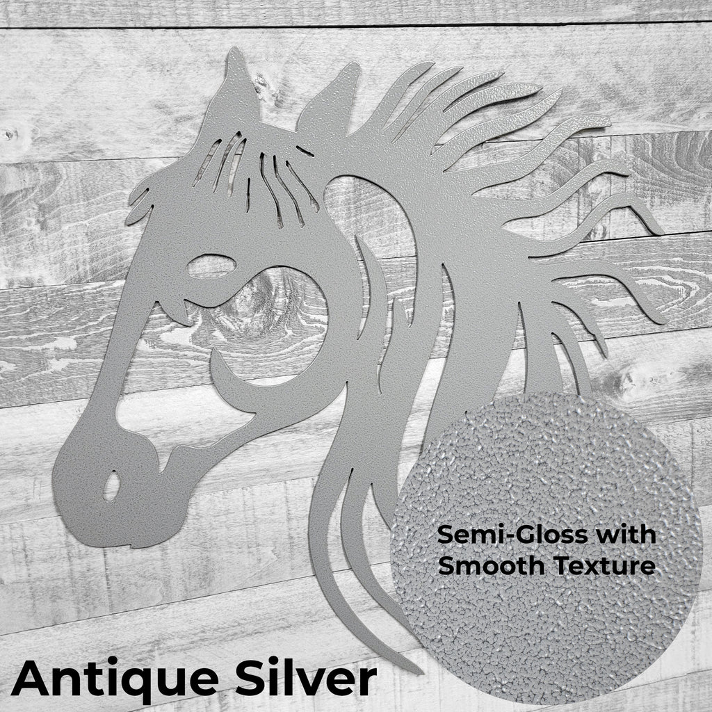 silver metal horse head wall art on a wooden background with a close-up of the color finish